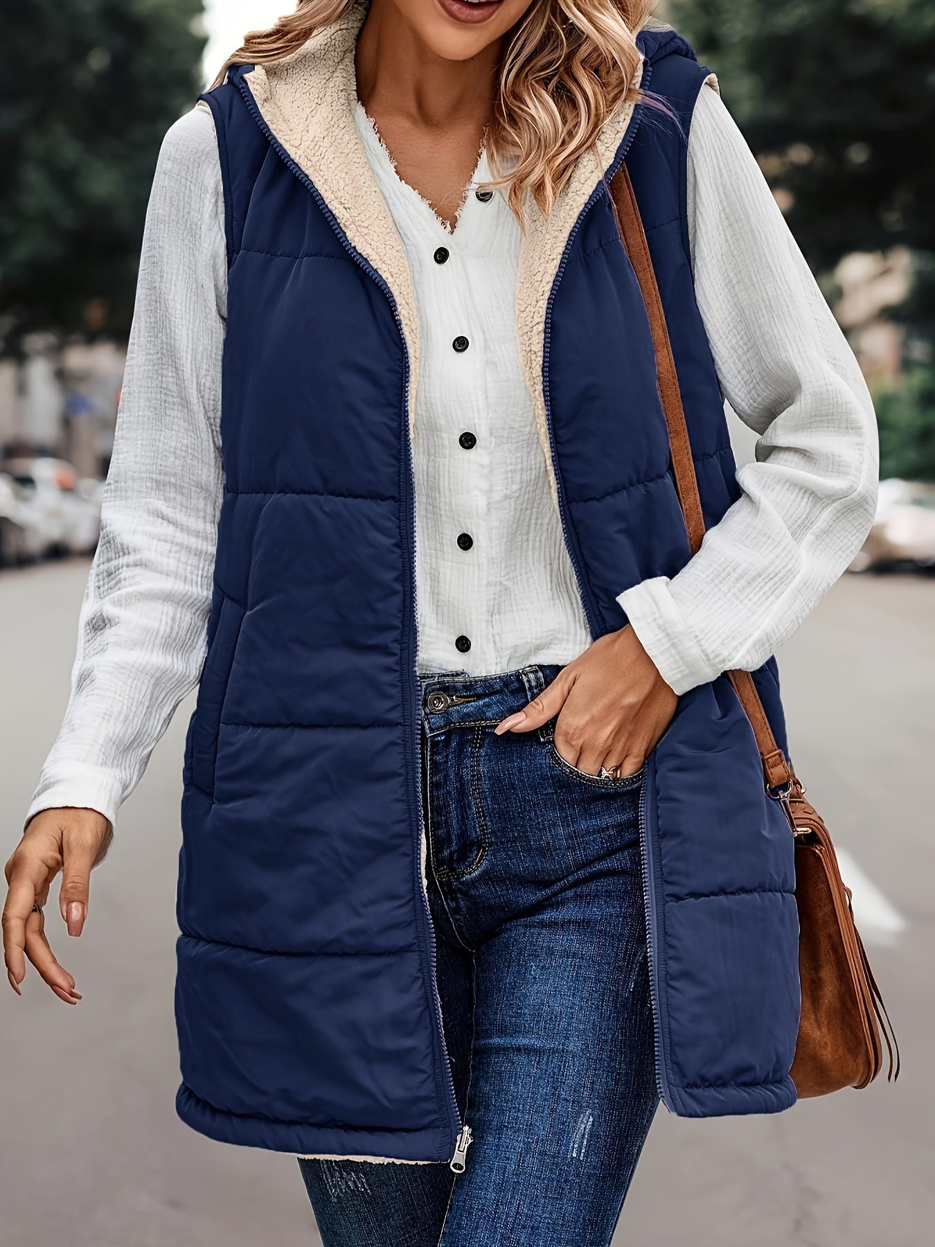 Warm vest met capuchon