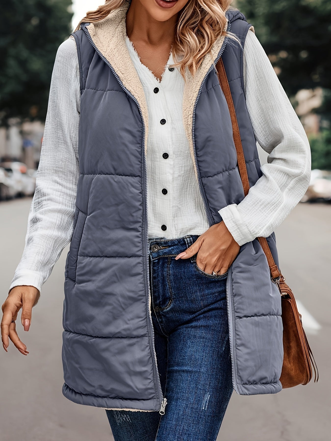 Warm vest met capuchon